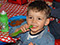 Boy eating lunch in Longscroft Dragonflies room